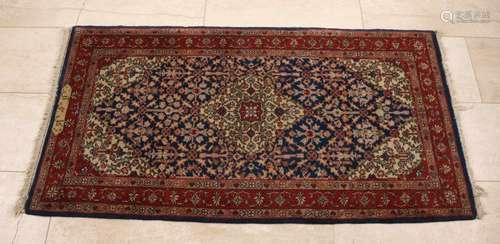 Old Persian praying blanket with text and floral decors. In the colors red, blue, cream etc .. Size: