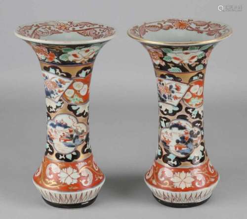 Two times 18th century Chinese Imari porcelain trumpet collar vases with landscapes, floral, and