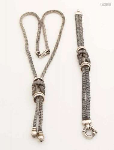 Set with silver necklace and bracelet, 925/000, from braided silver with button. 18cm and 45 cm.