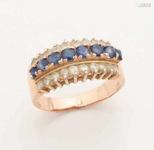 Red gold ring, 585/000 with sapphire and diamond. Wider ring with a row of 8 sapphires in the