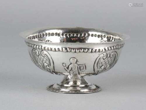 Small driven silver cream bowl on round base with various images. Provided with export