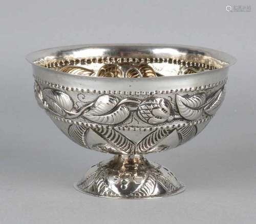 Driven silver cream bowl with images of fruits with leaves on round foot. Unclear brands. Probably