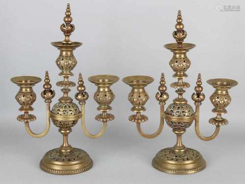 Two antique bronze historicism candle candlesticks. Neo Renaissance. Circa 1880. Size: H 33 cm. In