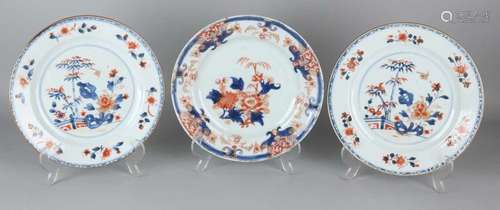 Three times 18th century Chinese Imari porcelain plates with floral decors. One plate of minimal