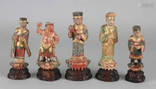 Five 19th century gold-plated polychrome Chinese carved altar figures on consoles. Minimal damage.