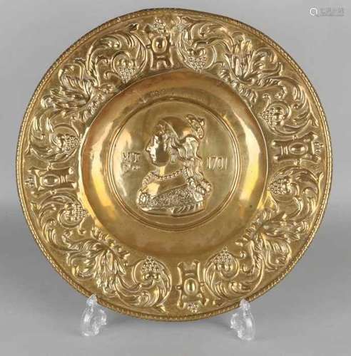 Antique German brass hammered wall dish with ladies portrait. Anno 1701, MT, Dau. With grape vines