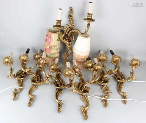 Seven large brass wall lamps in Rococo style. 20th century. Size: about 50 cm. In good condition.