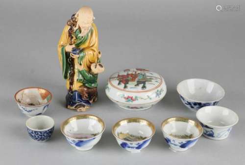 Nine times antique Chinese porcelain. Consisting of: Seven times rice wine cups with various decors.