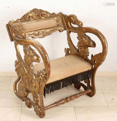 Rare 19th century wood-stained chair. Gilded with gold leaf, Empire style. With swan heads and crows