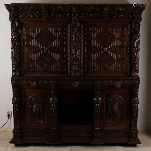 Antique oak sculpted cupboard with figures, garlands, fruit, cups etc. Partly 19th century, partly