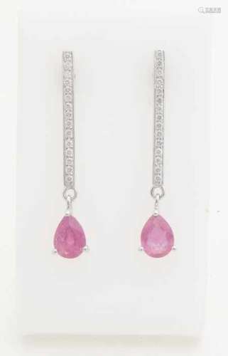 White gold earrings, 585/000, with ruby ​​and diamonds. Ear studs with a long white gold bar set