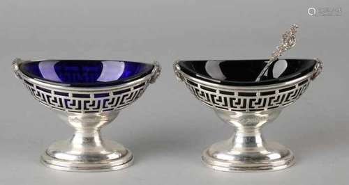 Two silver saltcellars, 925/000, with blue glass. Empire. Checkered barrels with sawn meander