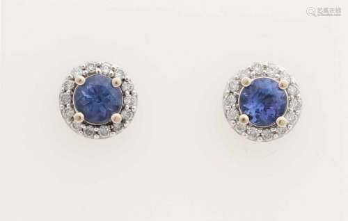 White gold earrings, 585/000, with sapphire and diamonds. Round ear studs in the middle set with a