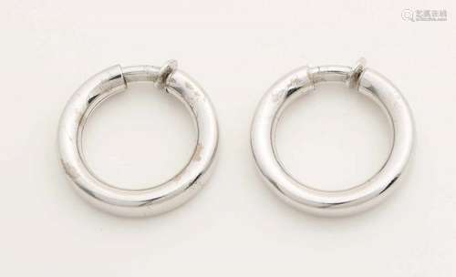 Large white metal earrings (clips) marked Chr. Dior 1972 Germany. ø 33 width 6 mm. In good condition