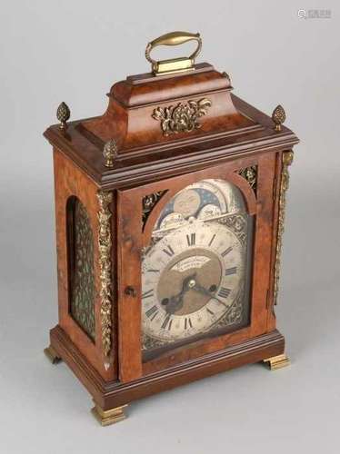 Large walnut table clock with moon stand and bronze fittings. 20th century. England. Percussion on