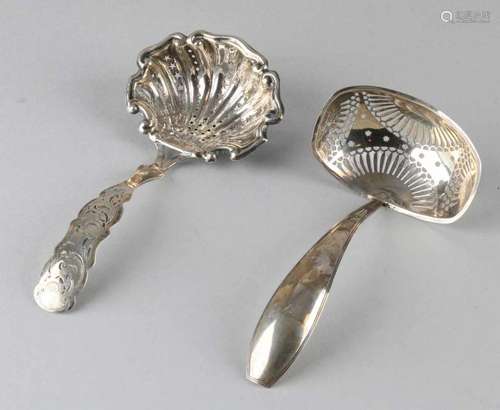 Two silver sprinkle spoons, 833/000, rectangular model with sawn bowls with shank with fillet