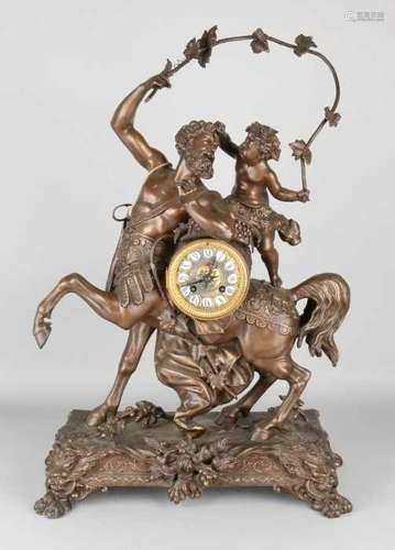 Large antique French pendulum with centaur, grape and putti. Composition metal. Clock has eight-