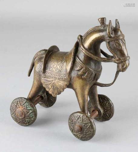 Antique Chinese bronze toy horse on wheels. 19th Century or older. Size: 17 x 16 x 10 cm. In good