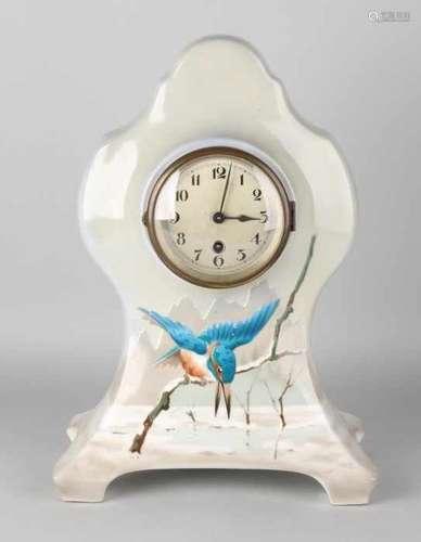 Antique Societe Ceramique Maastricht table clock with kingfisher decor in winter. Size: 38 cm. In