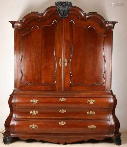 Large 18th century oak Baroque, Louis Quinze cabinet with brass fittings and claw feet. Circa