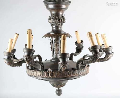 Large antique bronze with brass hanging lamp with caryatids etc. Circa 1920. Ten-light. Empire