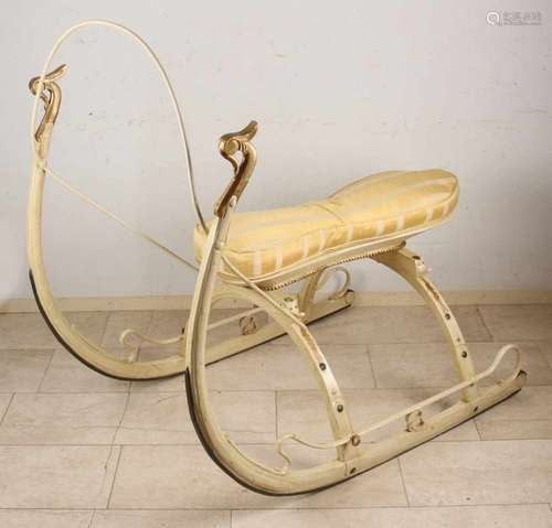 19th Century Russian sleigh with heads. Two-seater. Creme-gold colored. Size: 130 x 130 x 90 cm.