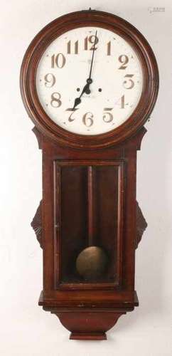 Very large antique school clock with eight-day movement, half hour stroke. Circa 1900. Pinewood