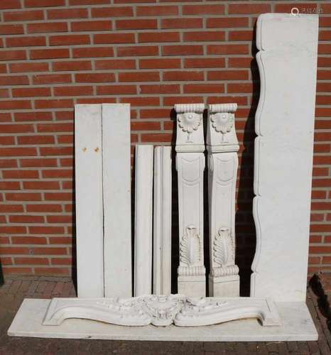 Large nine-part old white marble fireplace. 20th century. Some damage. Size: 112 x 151 x 29 cm. In