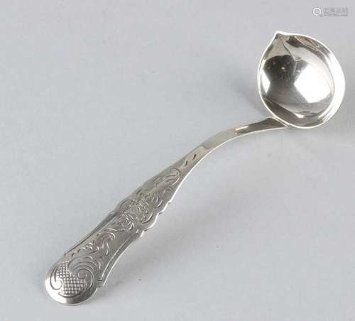 Beautiful 835/000 silver cream spoon with oval bowl and spout. Rounded hook handle with fine