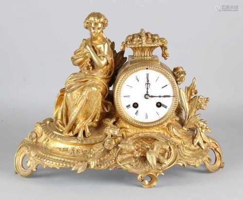 French gilded Louis Philippe pendulum. Woman with pigeons and fruit basket. Circa 1860. Eight-day