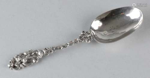 An antique silver birth spoon with double twisted handle crowned with a woman with children. MT .: