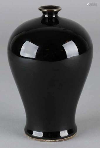 Old Chinese porcelain baluster shaped vase with black glaze and soil mark. Mei Ping. Size: H 14