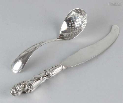 Silver scatter spoon and knife, 833/000, Spoon with pear shaped tray with star pattern attached to a