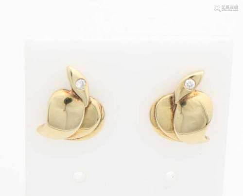 Yellow gold ear studs, 585/000 with diamond. Heart shaped ear studs with a marquis shaped part at