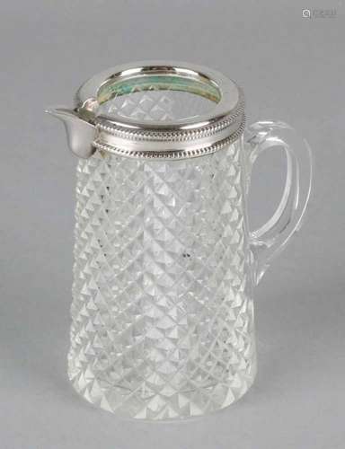 Crystal cream jug. Cut crystal cream jug with omgreep, diamond cut and sharpened star on the bottom.