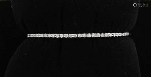 White gold bracelet, 585/000, with diamonds. White gold tennis bracelet with approx. 67 brilliant