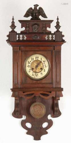 Antique German walnut Kienzle freeman with crown and eagle. Circa 1900. Size: 95 cm. In good