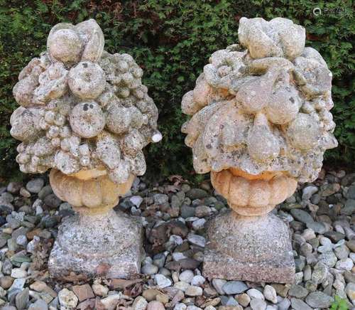 Two large concrete garden ornaments with fruit. 20th century. Size: 65 x 35 cm ø. In good condition.