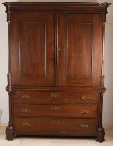 Antique oak Louis Seize cabinet with half Corinthian columns and bronze fittings. Circa 1800.