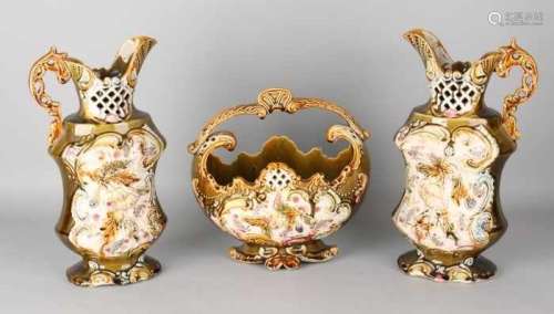 Three-piece antique English or German Majolica vases. Circa 1900. Two jars, glued. One flower pot,