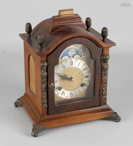 Walnut table clock with bronze fittings. Clock has eight-day movement, half hour stroke and moon