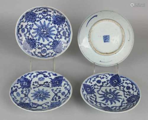 Four antique Chinese porcelain plates with floral decors and floor mark. Size: 17 - 8 cm ø. In