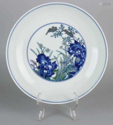 Old Chinese porcelain plate with garden decor and six characters. Size: ø 21.2 cm. In good