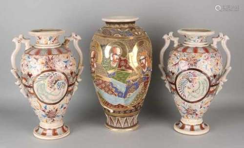 Three large old / antique Japanese Satsuma vases with floral and figural decors. Glued to one vase
