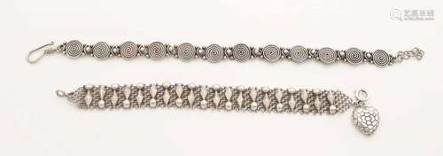 Two silver bracelets, a braided bracelet with soldered elements, width 12 mm, length 16 cm, and a