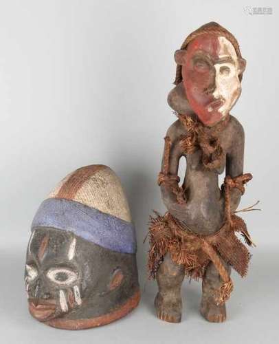 Twice African wood carving. Among others: Mask Nigeria, polychrome, Yoruba strain. Image Congo,