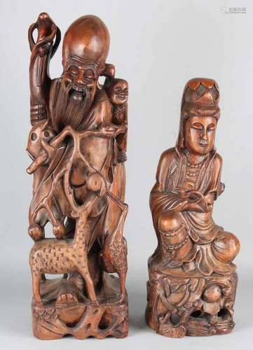 Two old Chinese wood-stained statues. Quan Yin and philosopher. 20th century. Size: 50 - 60 cm. In