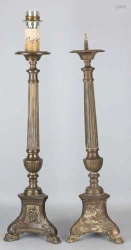 Two old bronze candlesticks, one of which electrified into a lamp. Baroque style. Size: 60 - 70