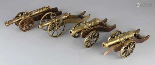 Four old bronze miniature cannons. Old example. 20th century. Size: 25 - 35 cm. In good condition.