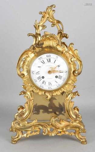 Gold plated brass Rococo pendulum with enamel dial. Second half of the 20th century. Eight-day